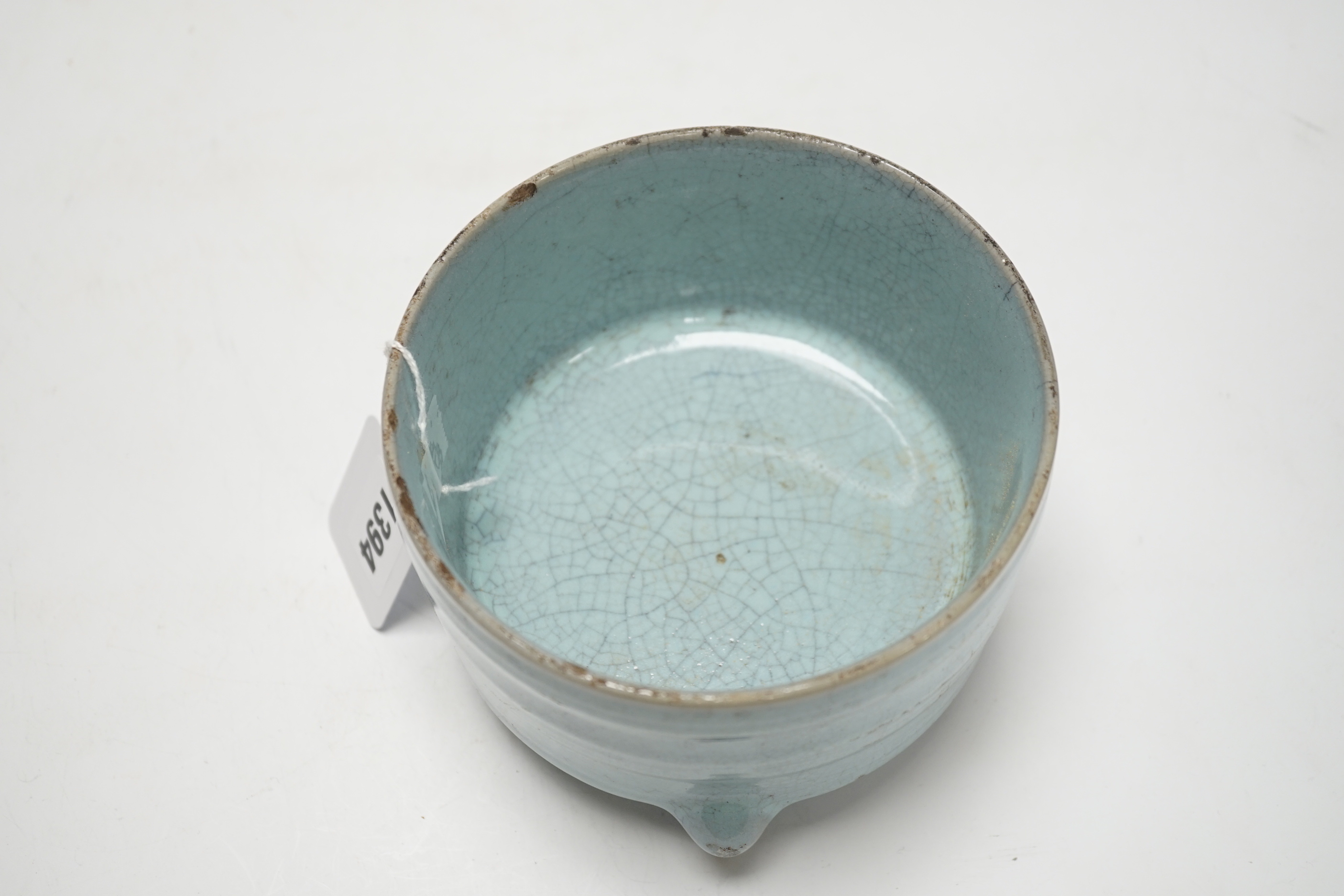 A Chinese Jun type tripod censer, 10cm tall